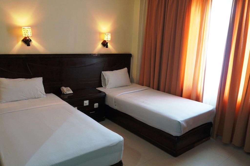 Edotel Minangkabau Padang (Sumatra) Quarto foto