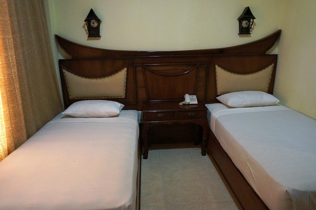 Edotel Minangkabau Padang (Sumatra) Quarto foto
